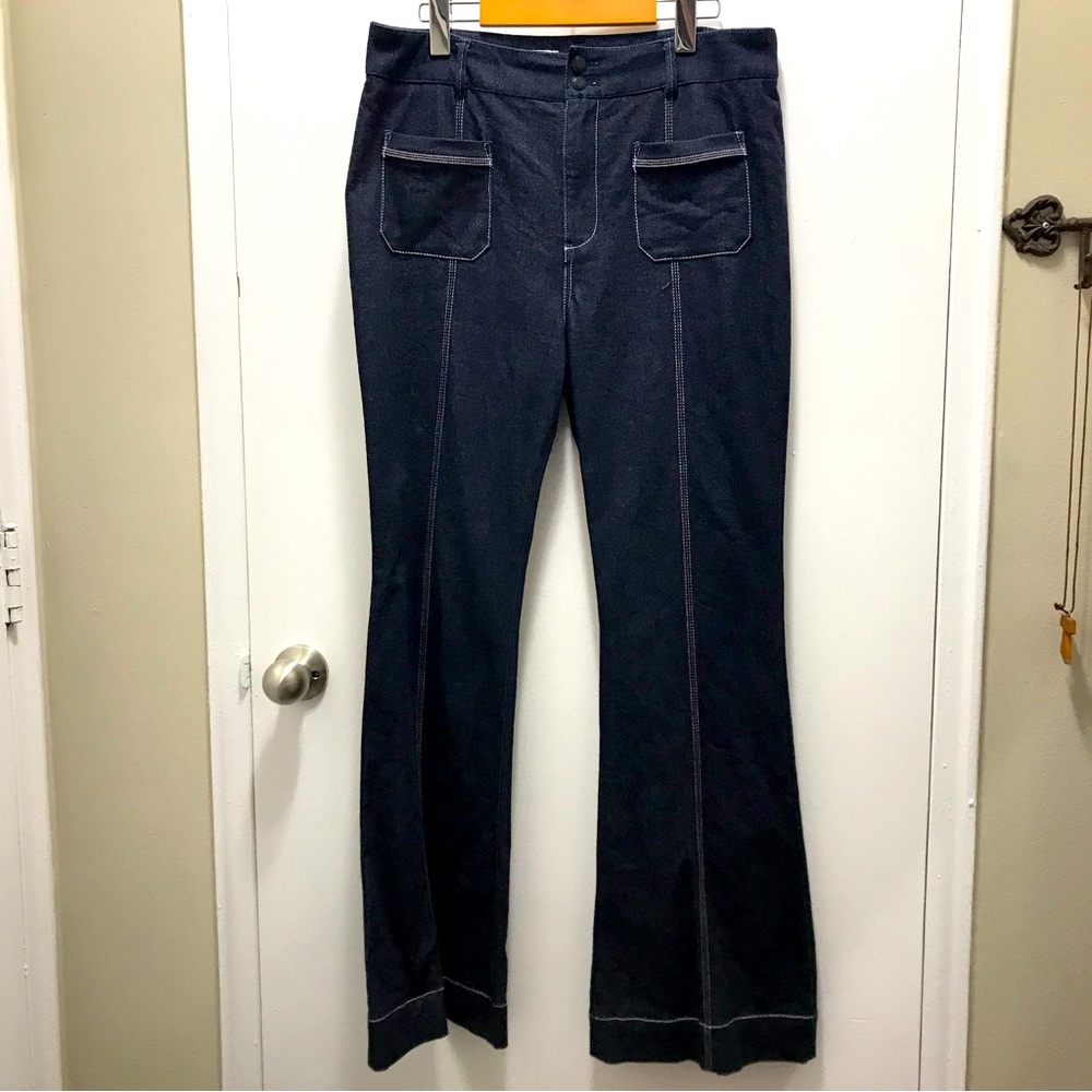 Pilcro and the Letterpress by Antropologie flare dark washed denim jeans…